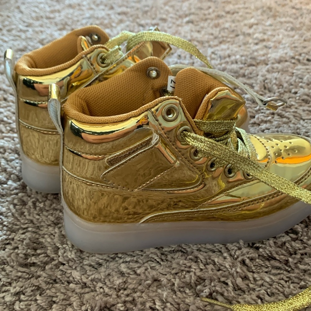 Toddler boys light up high top sneakers. Gold shoes with light up bottoms.